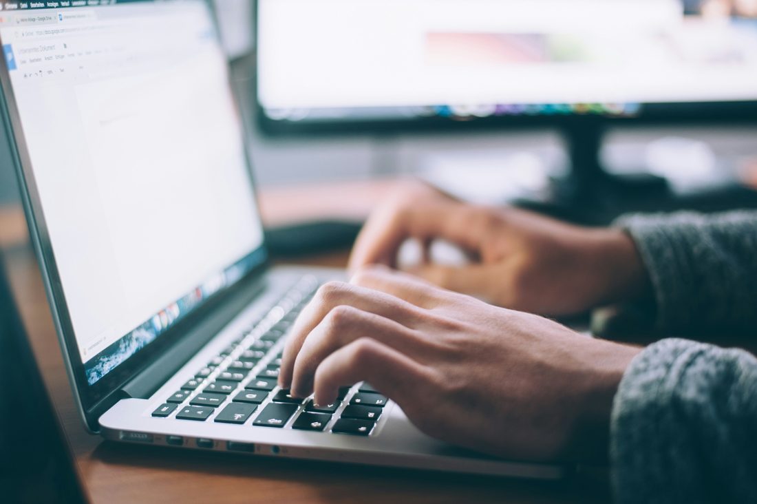 Small business owner working on a laptop
